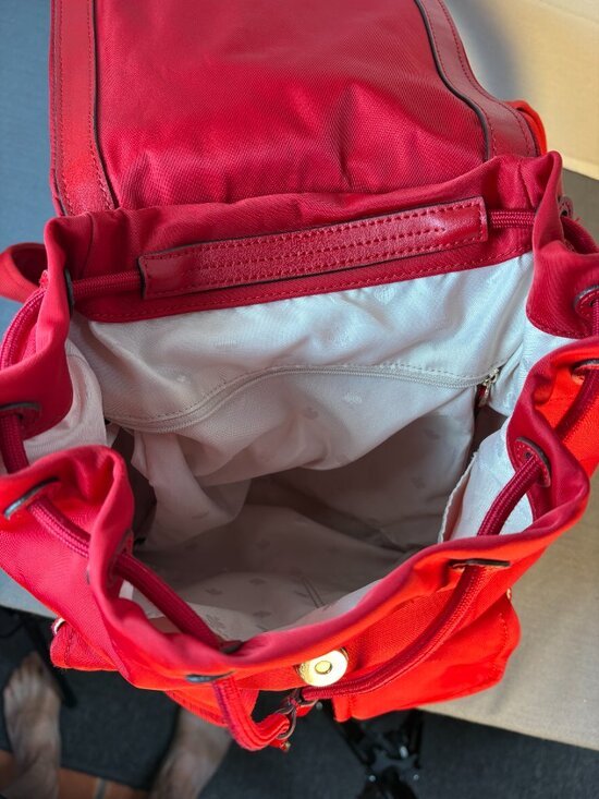 Kate Spade Carley Flap Backpack w/ Pockets, Drawstring, Nylon.- RED